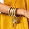 Ritika Sachdeva Golden Bangle Stack With Charms -Celestiagem Jewelry Shop 2911rs2 1