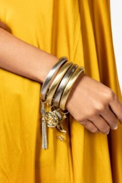 Ritika Sachdeva Golden & Silver Bangle Stack