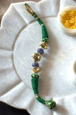 Heer- House Of Jewellery Green Polki Rakhi Bracelet
